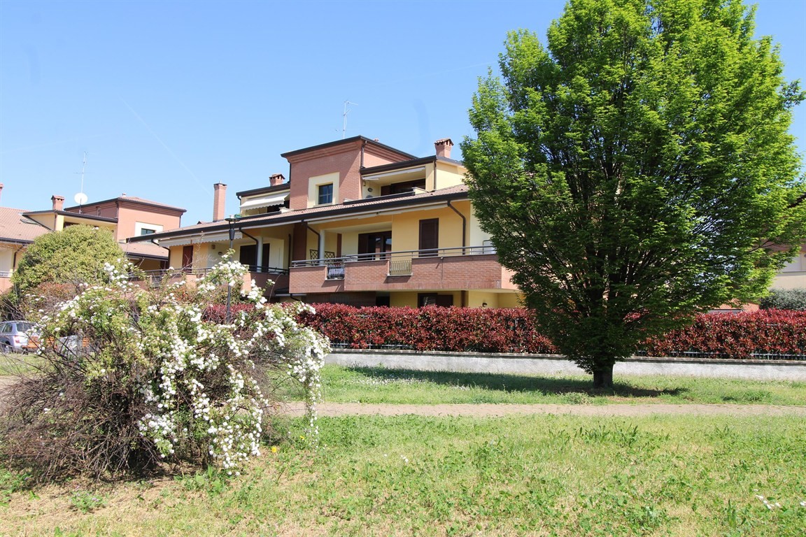 Appartamento con giardino privato e finiture di qualità